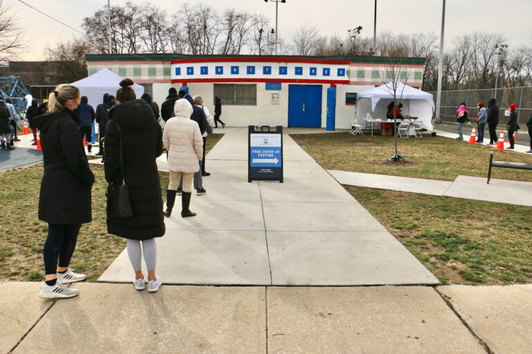 People line up for free COVID-19 tests outside Cibotti Recreation Center in Southwest Philadelphia. (Emma Lee/WHYY)