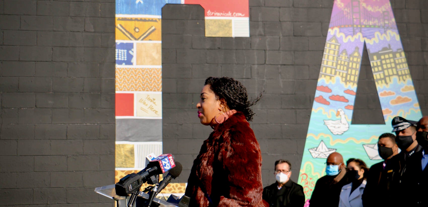 Fabric and fashion artist Terina Nicole Hill designed the letter C for the ''Camden Invincible'' mural. (Emma Lee/WHYY)