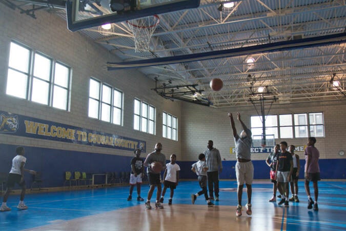 The Give And Go 12 and Under basketball athletes run drills