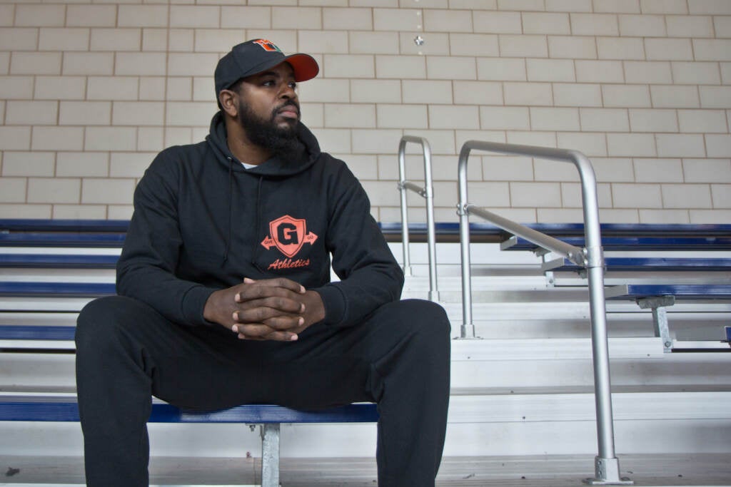 Andre Wright watches a basketball practice