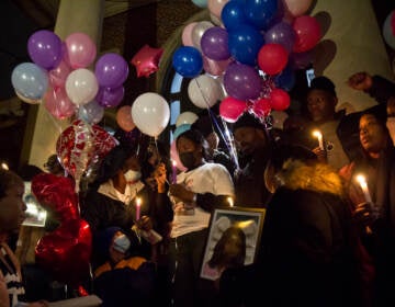 Family members of 12 people killed in a rowhouse fire asked for privacy to grieve outside the children’s school, Bache-Martin Elementary, on Jan. 6, 2022. (Kimberly Paynter/WHYY)