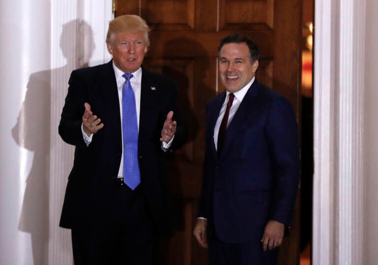 David McCormick poses with former President Donald Trump at the Trump National Golf Club Bedminster clubhouse, Sunday, Nov. 20, 2016, in Bedminster, N.J. McCormick is considering running in the 2022 Republican primary election for Pennsylvania's open U.S. Senate seat. (AP Photo/Carolyn Kaster, File)