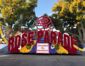 FILE - In this Jan. 1, 2020, file photo, a 2020 Rose Parade float is seen at the start of the route at the 131st Rose Parade in Pasadena, Calif. The Rose Parade and Rose Bowl college football game between Ohio State and Utah were set to go forward on New Year's Day despite surging cases of COVID-19, which forced the cancelation of the 2021 parade. (AP Photo/Michael Owen Baker, File)