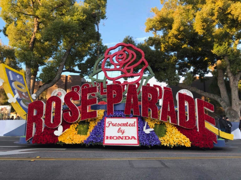 FILE - In this Jan. 1, 2020, file photo, a 2020 Rose Parade float is seen at the start of the route at the 131st Rose Parade in Pasadena, Calif. The Rose Parade and Rose Bowl college football game between Ohio State and Utah were set to go forward on New Year's Day despite surging cases of COVID-19, which forced the cancelation of the 2021 parade. (AP Photo/Michael Owen Baker, File)