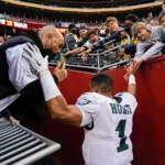 Philadelphia Eagles: QB Jalen Hurts helps fans when railing collapses after  win over Washington Football Team