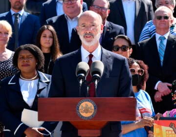 FILE - Pennsylvania Gov. Tom Wolf speaks after signing budget legislation June 30, 2021, in Harrisburg, Pa. Wolf is about to lay out his eighth and final state budget proposal. Pennsylvania's healthy account balances make this a 