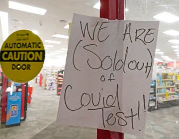 A sign was posted at the front of this CVS pharmacy at the Capitol in Jackson, Miss., Monday, Jan. 3, 2022. It was widely reported that the at-home COVID-19 tests were in very short supply throughout the state