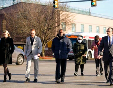 Willie Stokes, center, walks from a state prison in Chester, Pa., on Tuesday, Jan. 4, 2022 after his 1984 murder conviction was overturned because of perjured witness testimony. Stokes was serving a life sentence and spent decades in prison before learning the witness who testified against him at a 1984 court hearing soon pleaded guilty to perjury over the testimony.