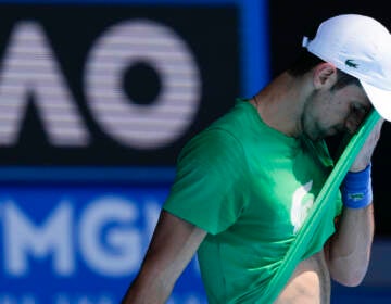 Defending men’s champion Serbia’s Novak Djokovic practices on Margaret Court Arena ahead of the Australian Open tennis championship in Melbourne, Australia, Thursday, Jan. 13, 2022. (AP Photo/Mark Baker)