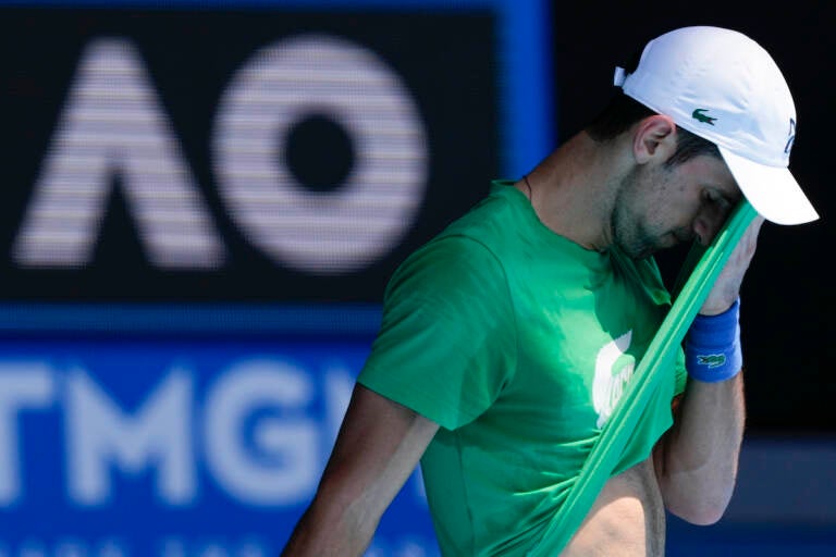 Defending men’s champion Serbia’s Novak Djokovic practices on Margaret Court Arena ahead of the Australian Open tennis championship in Melbourne, Australia, Thursday, Jan. 13, 2022. (AP Photo/Mark Baker)