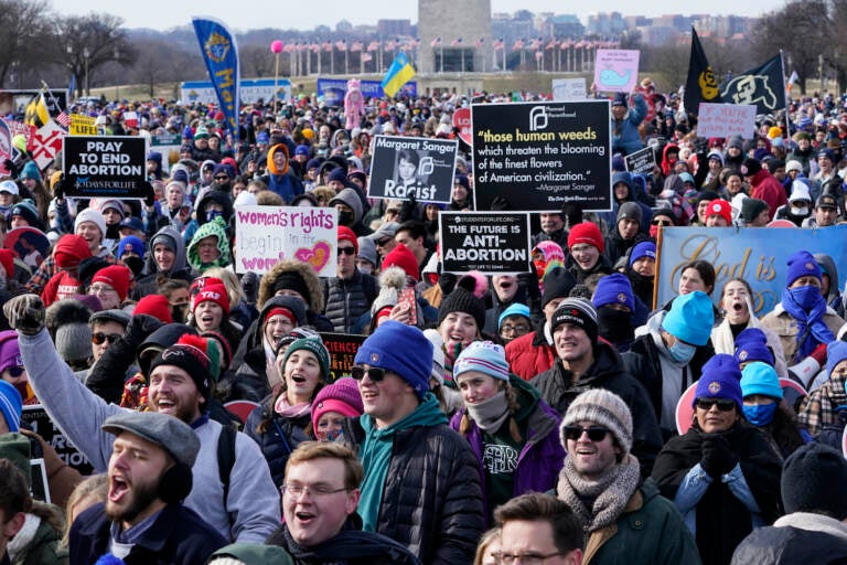 People attend the March for Life rally on the National Mall in Washington, Friday, Jan. 21, 2022. The March for Life, for decades an annual protest against abortion, arrives this year as the Supreme Court has indicated it will allow states to impose tighter restrictions on abortion with a ruling in the coming months. (AP Photo/Susan Walsh)