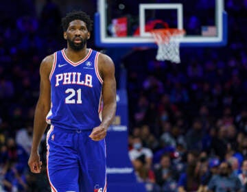 Philadelphia 76ers' Joel Embiid looks on during the first half of an NBA basketball game against the New Orleans Pelicans, Tuesday, Jan. 25, 2022, in Philadelphia. The 76ers won 117-107. (AP Photo/Chris Szagola)