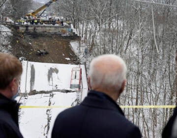 President Joe Biden visits the site where the Fern Hollow Bridge bridge collapsed Friday, Jan. 28, 2022, in Pittsburgh's East End. (AP Photo/Andrew Harnik)