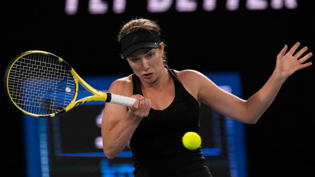 Danielle Collins of the U.S. plays a forehand return to Ash Barty of Australia during the women's singles final at the Australian Open tennis championships in Melbourne, Australia, Saturday, Jan. 29, 2022