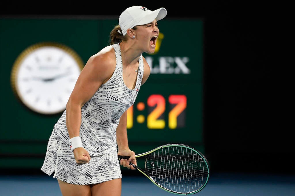 Ash Barty of Australia celebrates after defeating Danielle Collins of the U.S., in the women's singles final at the Australian Open tennis championships in Saturday, Jan. 29, 2022, in Melbourne, Australia