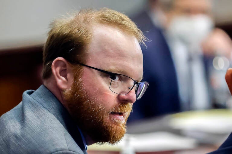 FILE - Travis McMichael is shown during the sentencing of he and his father Greg McMichael and neighbor, William 