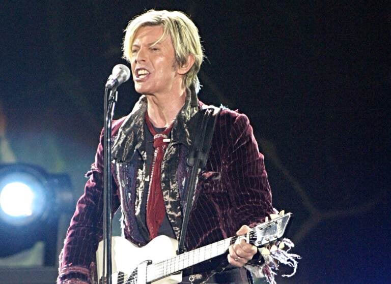 File photo: In this May 8, 2004 file photo, David Bowie performs at Chastain Park Amphitheatre in Atlanta.