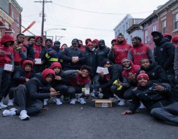 Members of Temple University's football team and Philadelphia firefighters volunteered on Martin Luther King Jr. Day to install smoke alarms in North Philly