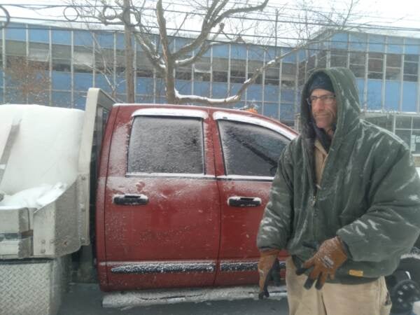 Dwain Livengood, of Livengood Family Farm, said he can't let down his customers and drove the 1.5 hours to Philly even though the usualy Saturday farmers market was closed due to the storm. (Emily Rizzo/WHYY)