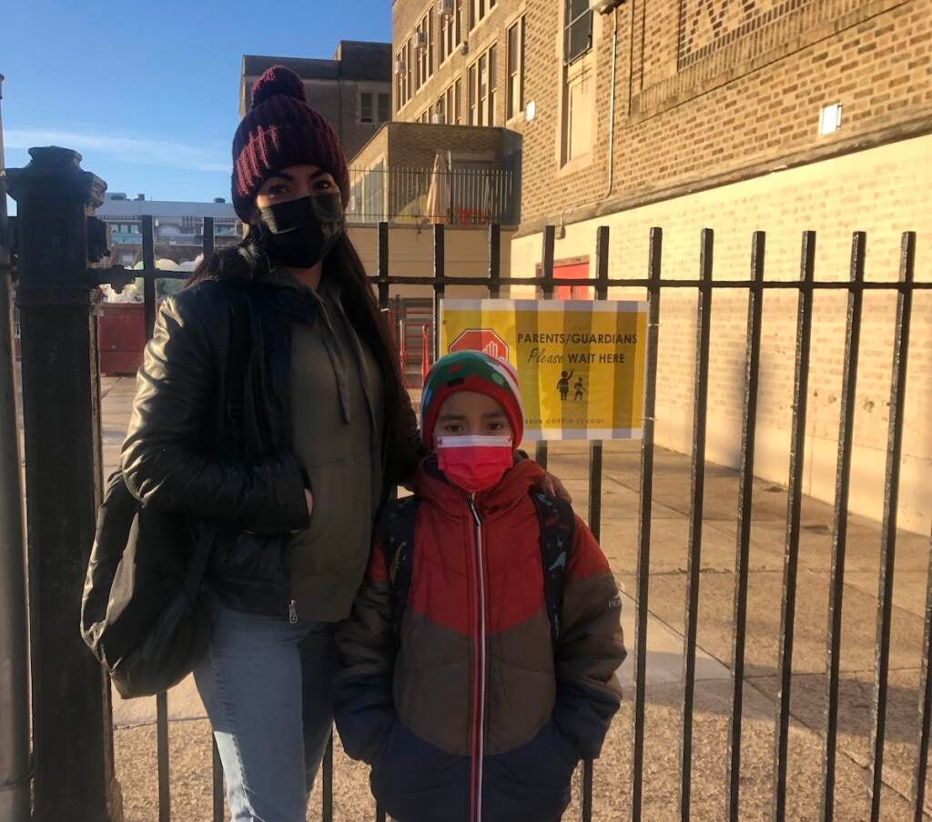 Berenice Guadarrama dropped off her seven-year-old son, Eder, on the first day back from winter break. His school opened in-person, while her daughter's went remote