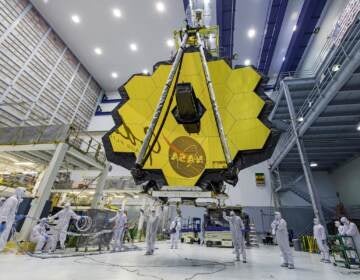 File photo: In this April 13, 2017 photo provided by NASA, technicians lift the mirror of the James Webb Space Telescope using a crane at the Goddard Space Flight Center in Greenbelt, Md. (Laura Betz/NASA via AP, File)