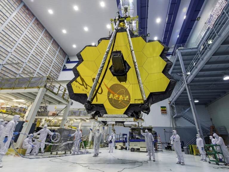 File photo: In this April 13, 2017 photo provided by NASA, technicians lift the mirror of the James Webb Space Telescope using a crane at the Goddard Space Flight Center in Greenbelt, Md. (Laura Betz/NASA via AP, File)