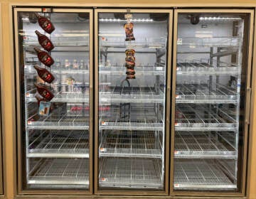 The milk shelf is mostly empty at a Giant grocery store on Tuesday in Washington, D.C. (Parker Purifoy/AP)