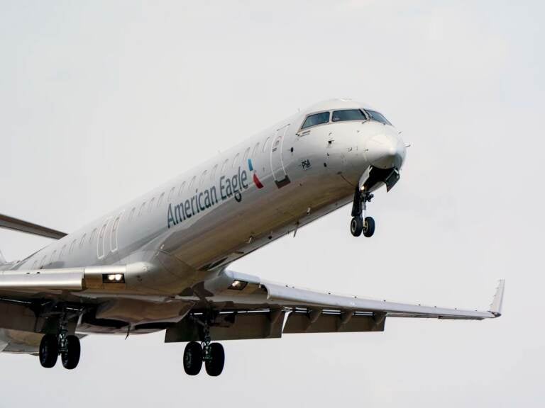 Planes that remain subject to flight restrictions around 5G cell phone towers are disproportionately smaller jets flown by regional airlines. An American Eagle passenger flight lands at Reagan Washington National Airport in Arlington, Va., across the Potomac River from Washington, Wed., Jan. 19, 2022. The airline industry is raising the stakes in a showdown with AT&T and Verizon over plans to launch new 5G wireless service this week, warning that thousands of flights could be grounded or delayed if the rollout takes place near major airports