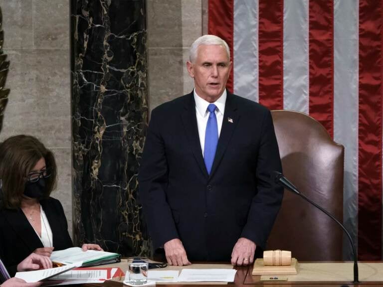 File photo: Vice President Mike Pence listens after reading the final certification of Electoral College votes cast in November's presidential election during a joint session of Congress after working through the night, at the Capitol in Washington, Thursday, Jan. 7, 2021. (AP Photo/J. Scott Applewhite, Pool)
