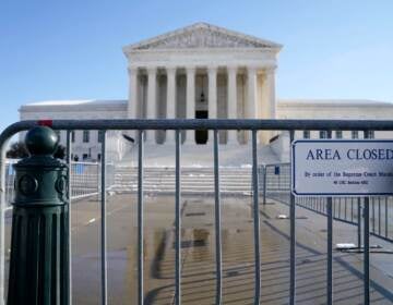 The Supreme Court shown Friday, Jan. 7, 2022, in Washington. The Supreme Court is taking up two major Biden administration efforts to bump up the nation's vaccination rate against COVID-19 at a time of spiking coronavirus cases because of the omicron variant