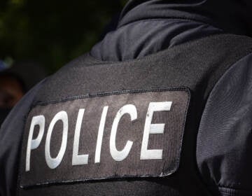 A Chicago police officer's uniform pictured in October 2021 in Chicago, Illinois. A new preliminary report says 458 U.S. law enforcement officers died in 2021, citing COVID-19 as the leading cause of death for the second consecutive year. (Scott Olson/Getty Images)