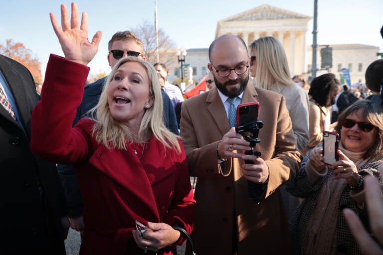 WASHINGTON, DC - DECEMBER 01: Rep. Marjorie Taylor Greene (R-GA) joins fellow anti-abortion activists in front of the U.S. Supreme Court as the justices hear hear arguments in Dobbs v. Jackson Women's Health, a case about a Mississippi law that bans most abortions after 15 weeks,  on December 01, 2021 in Washington, DC. With the addition of conservative justices to the court by former President Donald Trump, experts believe this could be the most important abortion case in decades and could undermine or overturn Roe v. Wade. (Photo by Chip Somodevilla/Getty Images)