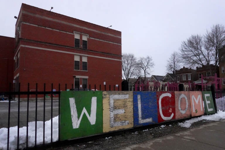 CHICAGO, ILLINOIS - JANUARY 05: A sign on the fence outside of Lowell elementary school welcomes students on January 05, 2022 in Chicago, Illinois. Classes at all of Chicago public schools have been canceled today by the school district after the teacher's union voted to return to virtual learning, citing unsafe conditions in the schools as the Omicron variant of the coronavirus continues to spread.   (Photo by Scott Olson/Getty Images)