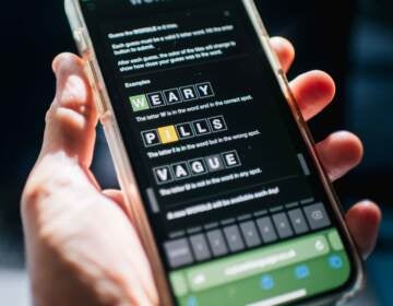 The New York Times has purchased the online word game Wordle has that took off last fall, with people posting their daily scores. (Brandon Bell/Getty Images)