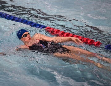 Lia Thomas swims in a pool