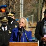 U.S.Rep. Mary Gay Scanlon speaks from a podium at Jerome Brown Playground
