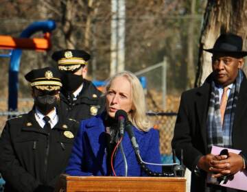 U.S.Rep. Mary Gay Scanlon speaks from a podium at Jerome Brown Playground