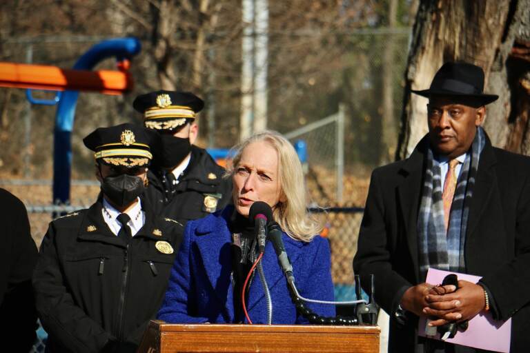 U.S.Rep. Mary Gay Scanlon speaks from a podium at Jerome Brown Playground