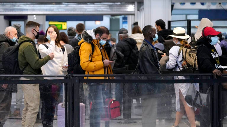 Travelers line up at O'Hare International Airport