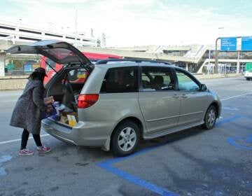 After almost 50 years under Philadelphia Parking Authority control, the airport parking concession could soon be run by a private company. (Emma Lee/WHYY)