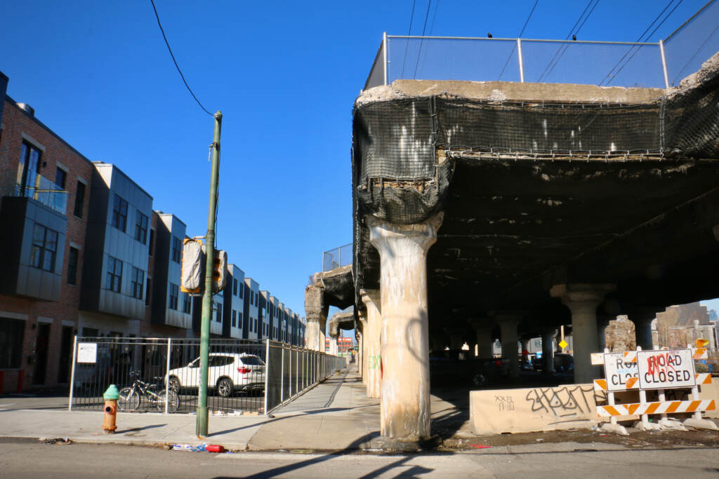 New houses front the crumbling 25th Street Viaduct at Tasker Street