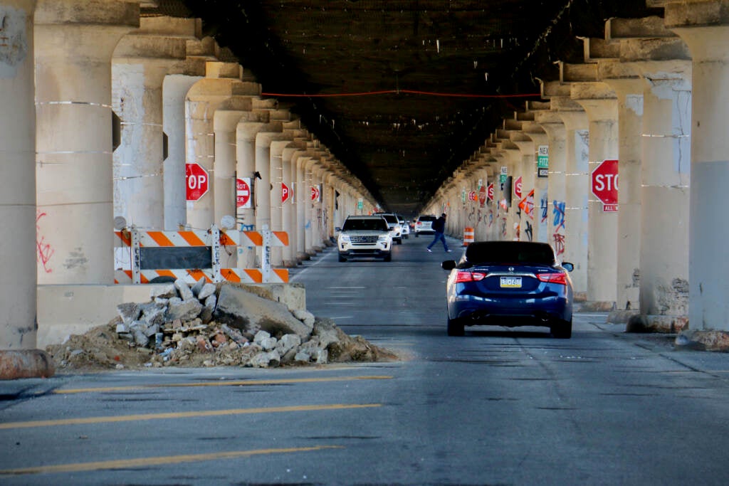 Cars are seen under the 25th Street Viaduct