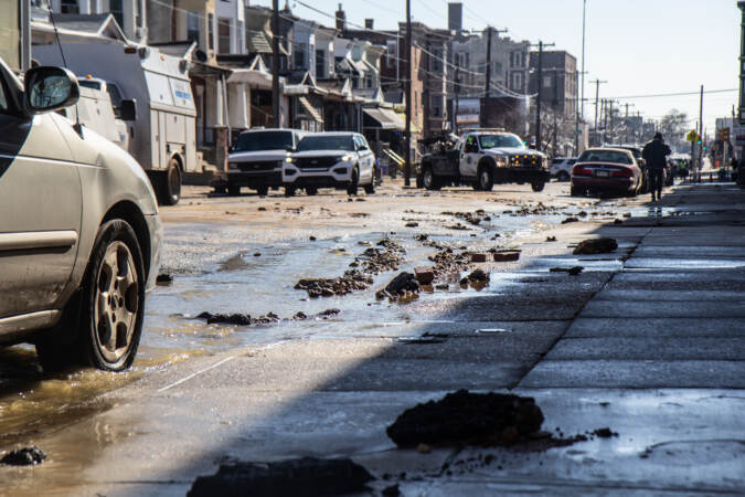 The cleanup of sediment and debris on streets surrounding a water main break