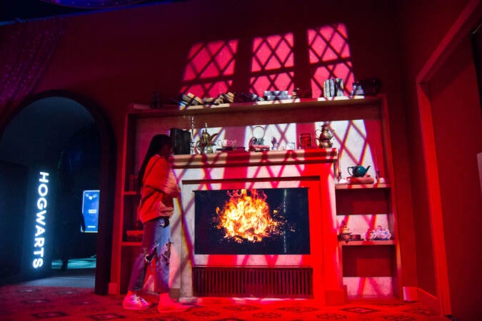 Screens recreate the movie magic at ''Harry Potter™: The Exhibition'' at the Franklin Institute in Philadelphia. (Kimberly Paynter/WHYY)