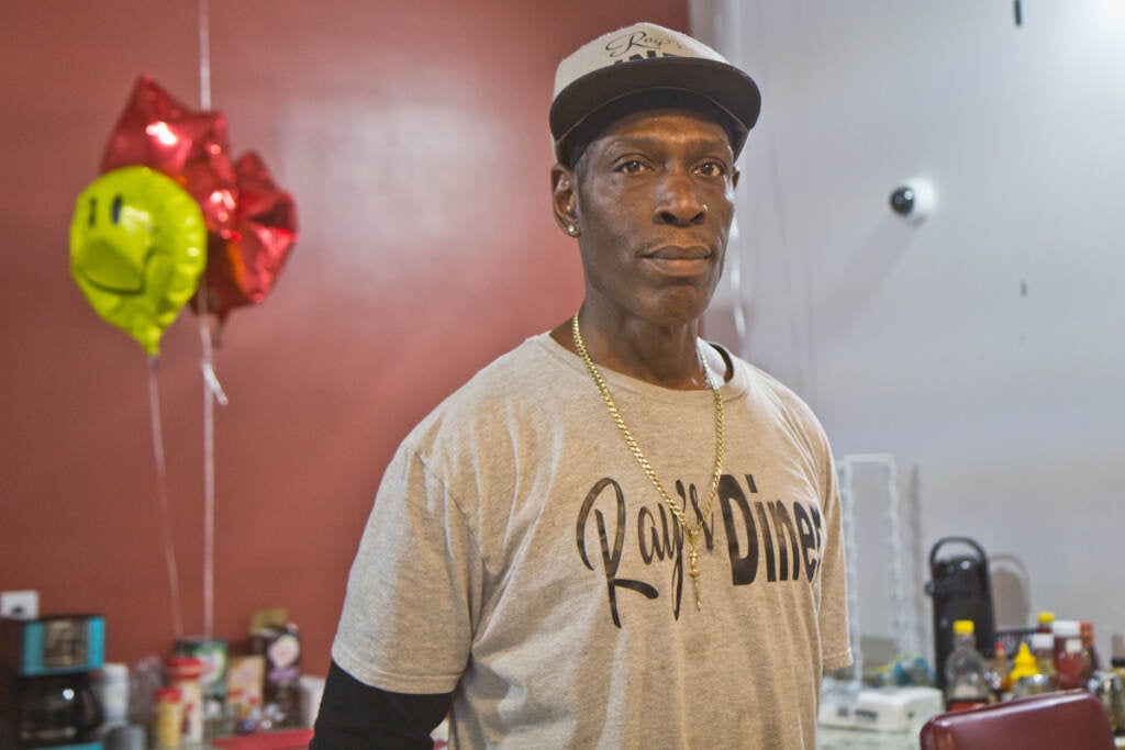 Raymond Tillery behind the counter