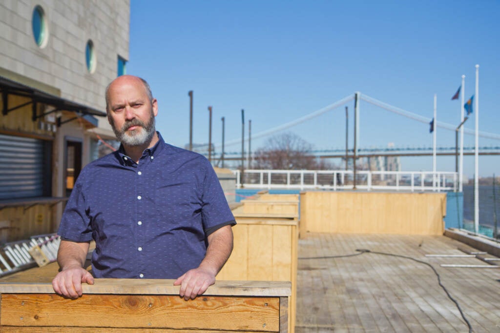 Avram Hornik stands outside Liberty Point