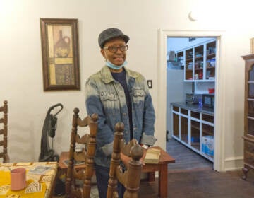 Asantewaa Nkrumah-Ture stands inside a dining room