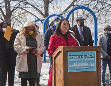 Philadelphia Councilmember Helen Gym held a press conference at a playground in Southwest Philadelphia on Passyunk Ave. near the oil refinery, announcing plans to introduce The Community Health Act to council, on Feb. 2, 2022. (Kimberly Paynter/WHYY)