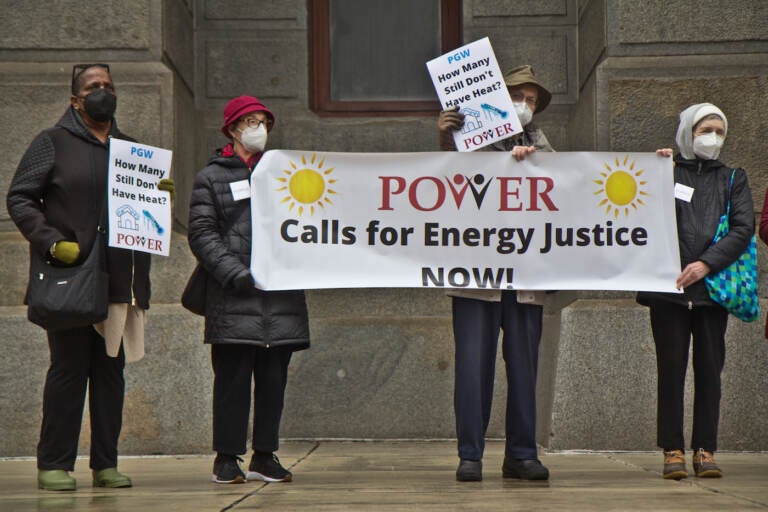 Members of the POWER Interfaith organization held a protest and prayer vigil for people in Philadelphia living without heat outside City Hall, on February 3, 2022. (Kimberly Paynter/WHYY)