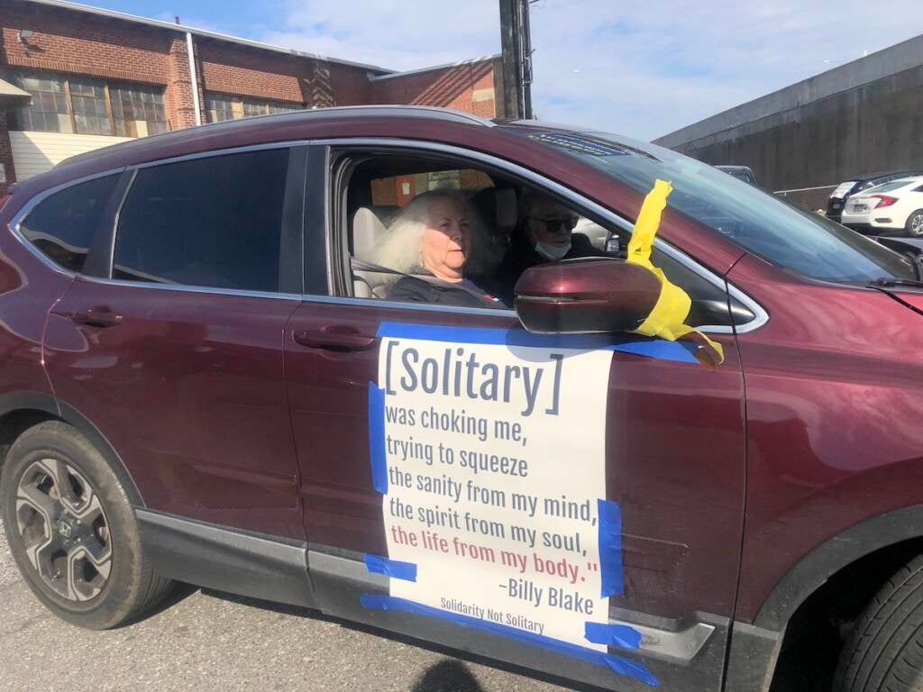 A car preparing to drive down State Road in Northeast Philadelphia, part of a caravan to protest the conditions inside Philly jails